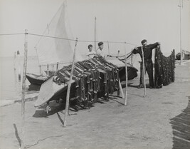 Fishermen hanging fishnet, Italy