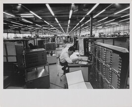 Man working at his desk in IBM Factory, Mainz, West Germany