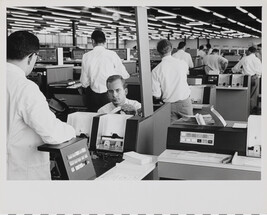 Men working in cubicles at IBM Factory, Mainz, West Germany