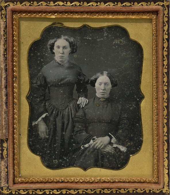 Two Women (possibly Twins or Sisters)