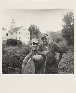 Elwin Coburn with a Scarecrow in his Garden Behind the Strafford Town House