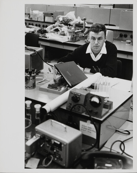 Man taking notes at desk in IBM Factory, Mainz, West Germany