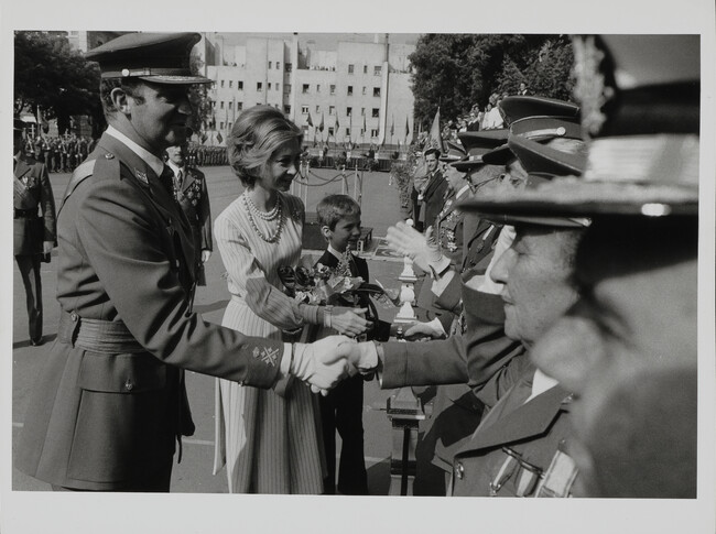 King Juan Carlos, Queen Sophie and their son Crown Prince Philipe being welcomed to the Parade in Madrid for Armed Forces Day. Spain, 1977