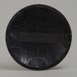 Argillite Plate with Semi-Circular Compass Rose and Tobacco Leaf Motifs with a Cross Hatched Rectangle...