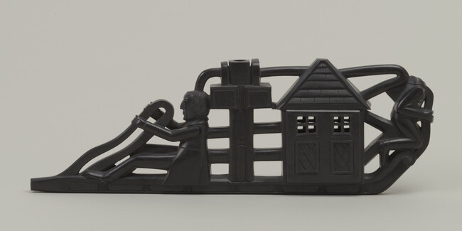 Argillite Ship Panel Pipe, depicting a Steamship, perhaps a Whaler, with the Cabin, Smokestack, Rudder, Figure (head missing), and a Anglo-European Helmsman