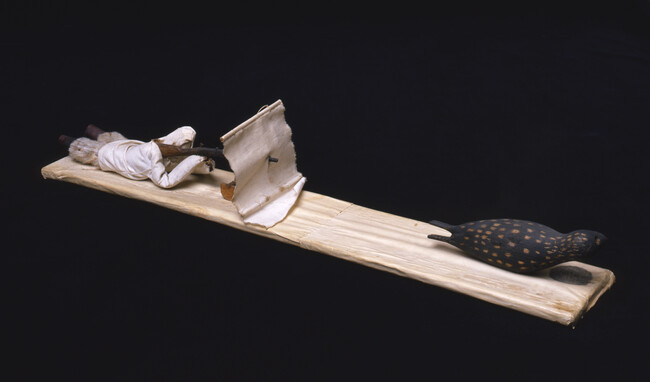 Souvenir Model of a Man Seal Hunting in the Spring using a Blind and a Gun Stand
