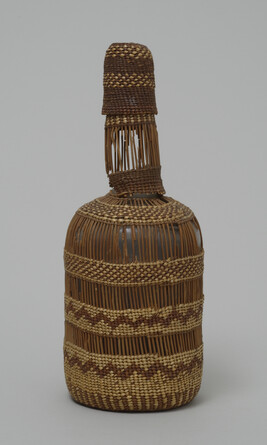 Glass Bottle covered in Basketry
