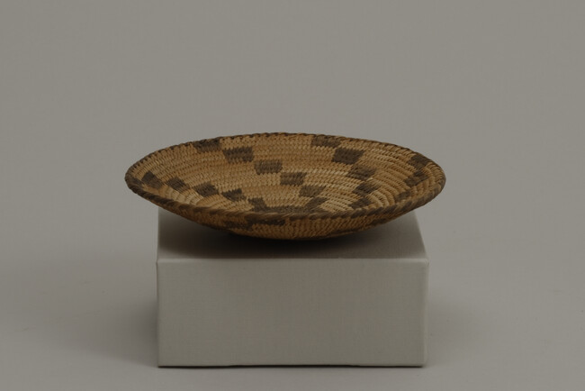 Basket in a shallow bowl shape