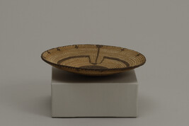Basket in a miniature shallow bowl shape