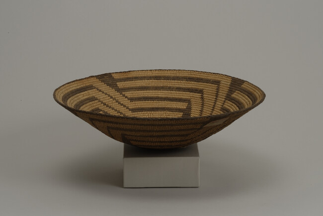 Basket in a shallow bowl shape