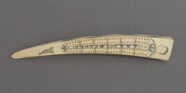 Ivory Cribbage Board: Paired Holes with a Human Head, Green Leaves and a Seal; Reverse: Scene of a Man...