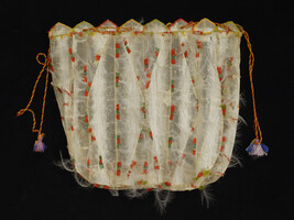 Bag made of Seal or Sea Lion Gut, with a silk draw string, decorated with silk thread and white feathers