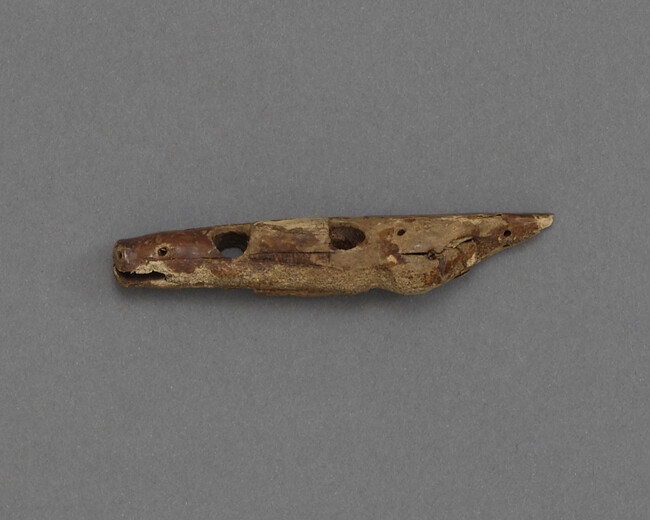 Harpoon Head, Bone, No Barb, Sides Carved to Resemble a Seal Head.