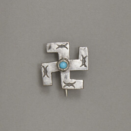 Silver Pin (Whirling Log symbol)