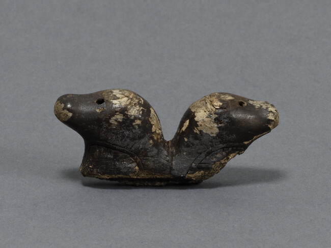 Fragment, Bone or Dark Ivory 2 Seal Heads