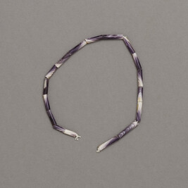 Wampum (string of purple beads)