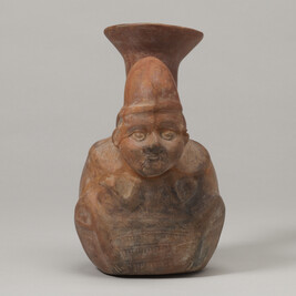Single-Spout Effigy Vessel in the Form of a Man carrying a Bundle