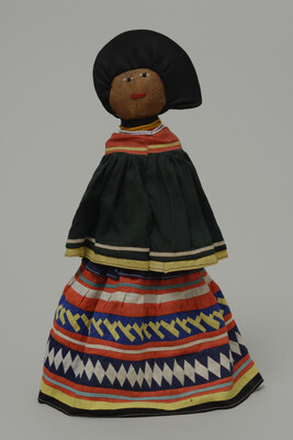 Doll representing a Seminole Woman wearing an Everyday Dress