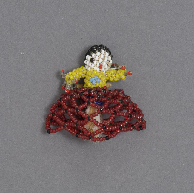 Miniature Doll Pin representing a Zuni Woman