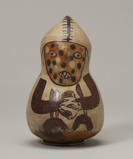 Single-spout Bottle in the form of a Hooded Figure (one of a pair)
