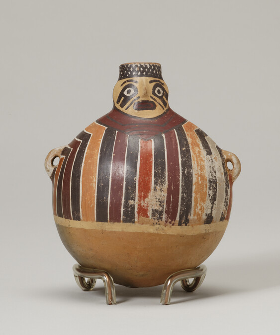 Face-Neck Bottle or Flask in the Form of a Person wearing a Striped Tunic