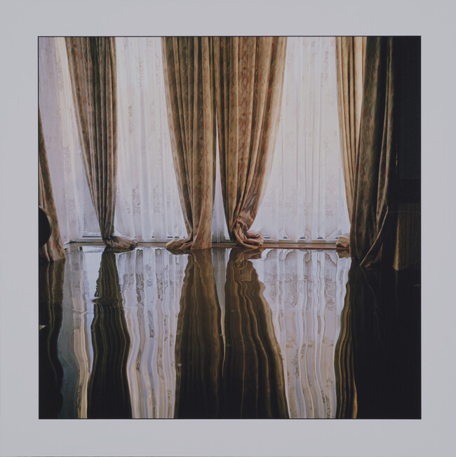 The Home of John Jackson, Reflection of Curtains Inside a House in Toll Bar Village near Doncaster, England, Summer 2007; from the portolio Drowning World