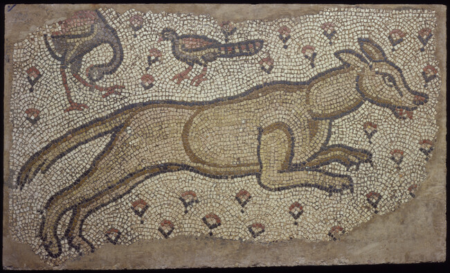 Fragment of a Mosaic Floor Panel depicting a Rampant Dog in Flying Gallop