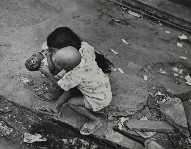 Three Indian Children Playing in the Street