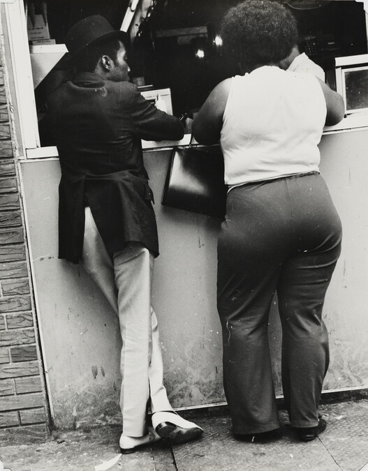 Man and Woman at Food Stand