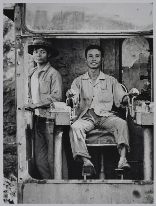 Excavation worker Chan Van Shing and his assistant Fung Dyk Nguyen, Vietnam