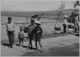 Vietnamese villagers by the roadside (right panel of panorama)