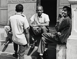Men on a stoop, Cuba