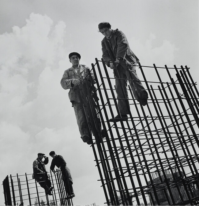 Construction Workers with Rebar Towers