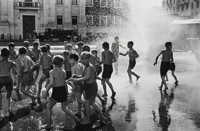 A Hot Summer's Day: Children at Play in the Spray of Moscow's First Sprinkler-Truck