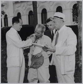 Ho Chi Minh with cigarette and large leaf meeting with Voroshilov, Vietnam