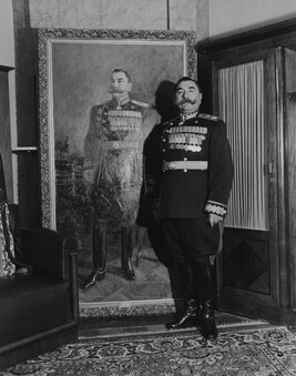 Marshal Semyen Budyeny Poses Beside his Official Portrait