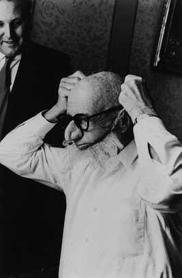 Norman Rockwell tries on a Mask Beard, Nose and Glasses, Moscow