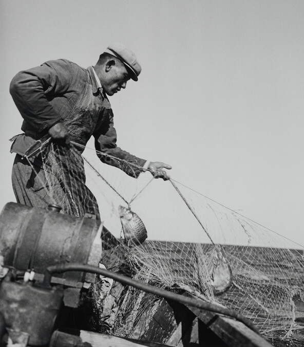 Pacific Fisherman with his Nets