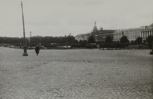 View of individual in cobblestone plaza, Leningrad