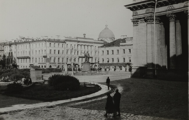 Plaza scene with small park and statue, Leningrad