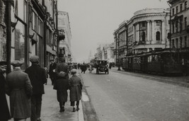 View of street with pedestrians, car, and streetcar, Leningrad