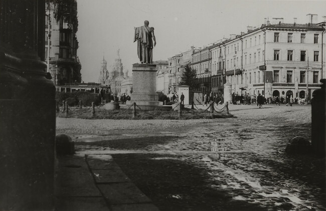 View of statue in plaza with onion domes in background, Leningrad