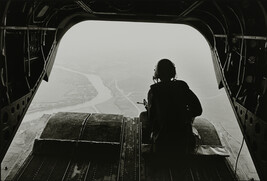 Crewman, CH-47A (Chinook) helicopter on mission over Mekong Delta, August 1967