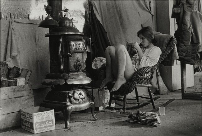 Untitled (Interior Scene - girl seated before woodstove)
