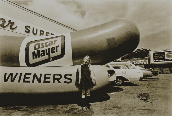 Young Girl Standing Next to an Oscar Meyer Wienermobile, Rochester, New York,