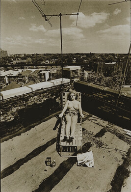Sally Krims Sunbathing on the Roof of 2402-63rd Street, Brooklyn, New York