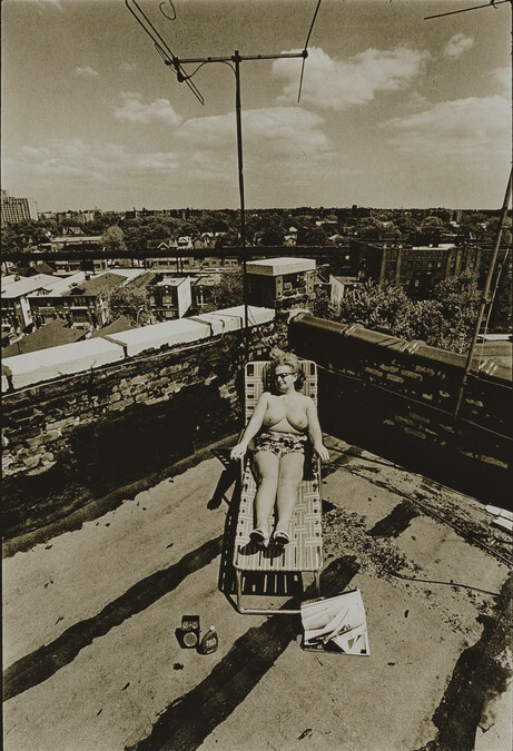 Sally Krims Sunbathing on the Roof of 2402-63rd Street, Brooklyn, New York