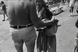 Man with Bare Back Talking to Old Woman, 1979 (Venice, CA), number 3, from the portfolio Women Are...