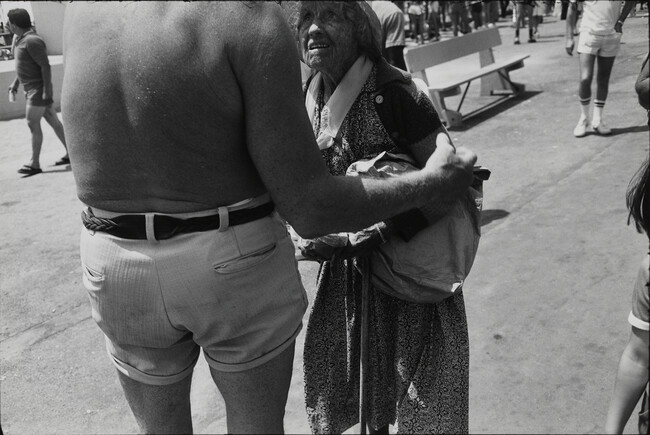 Man with Bare Back Talking to Old Woman, 1979 (Venice, CA), number 3, from the portfolio Women Are Beautiful