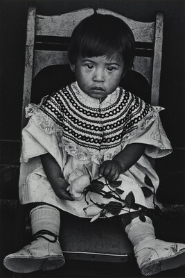 Seated Child with Plastic Rose, Barillas, number 28, from the portfolio, Itinerant Images of Guatemala